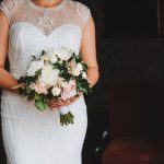 beautiful plus sized bride holding her wedding bouquet 110539 168