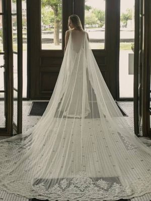 Cape Wedding Dress by Naama Navipur